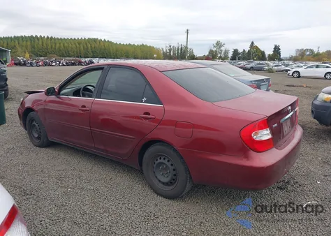 2004 Toyota Camry Le z USA, uszkodzony, nr VIN JTDBE32K340255550